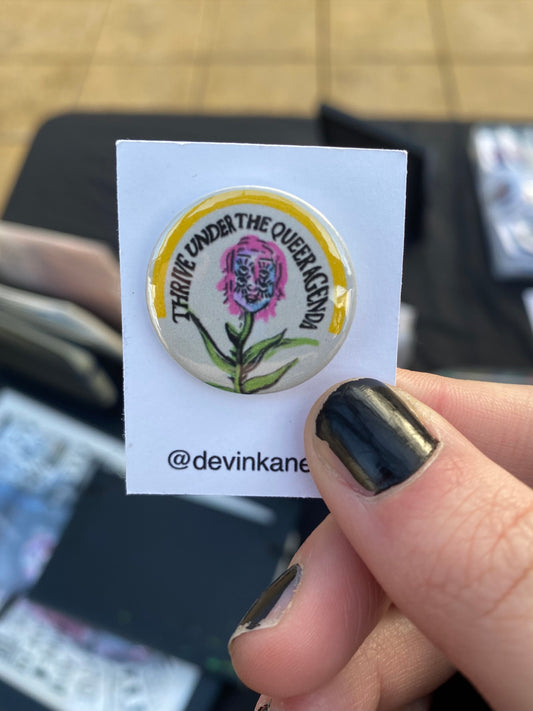 “Thrive Under the Queer Agenda” Badge